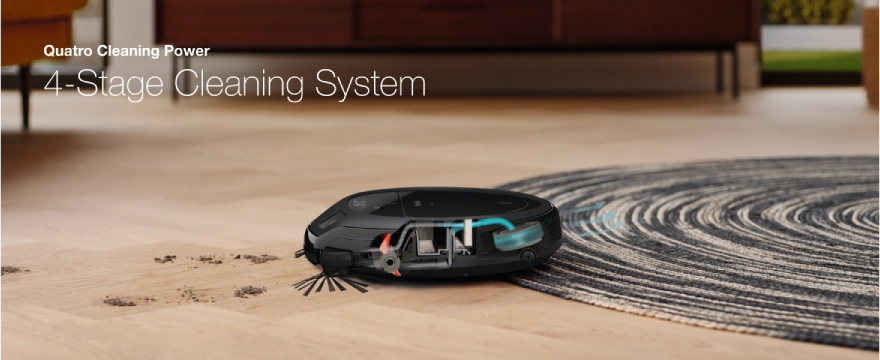 Miele Scout RX3 robot vacuum cleaning hardwood, carpet surfaces, and rugs with its dual brush system.